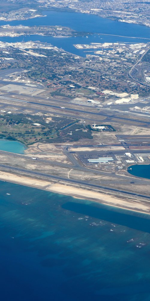 Car on Hawaiian road near Daniel K. Inouye Airport